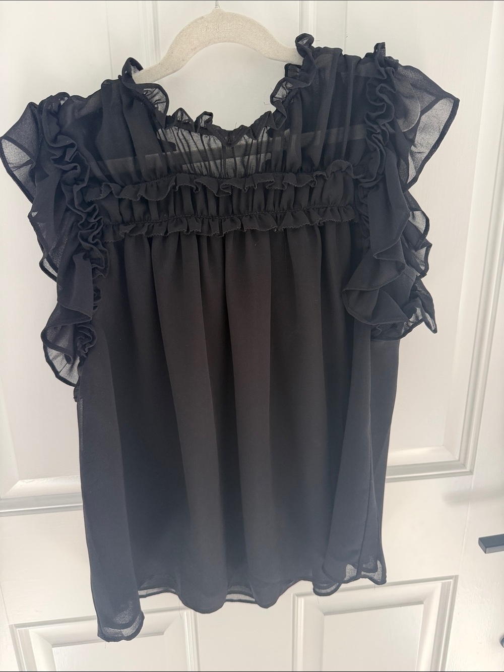 State sleeveless black blouse